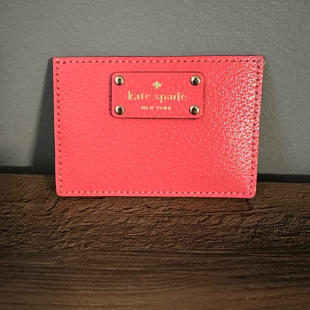 kate spade New York Coral/Pink Travel Wallet. NWOT.